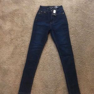 Dark blue jeans from Fashion Nova